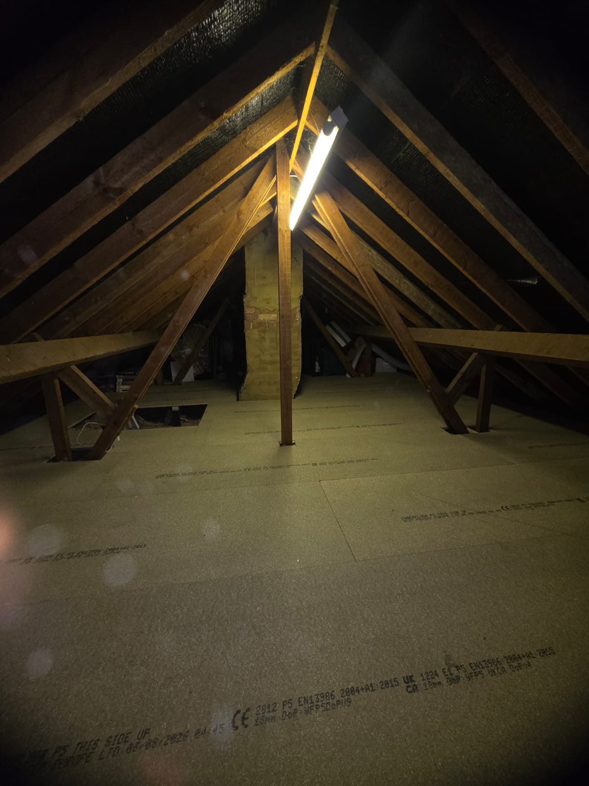 Deep 300mm loft insulation laid perfectly to maintain vital eaves ventilation
